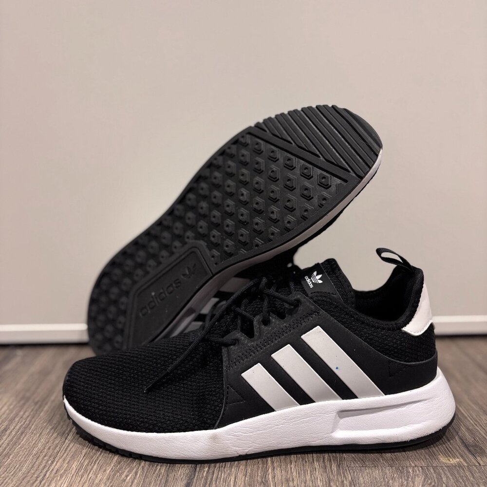 Adidas Running Shoes in sleek black with white stripes
